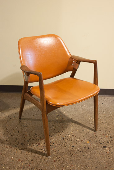 Mid-century Orange Leather Chair  $25